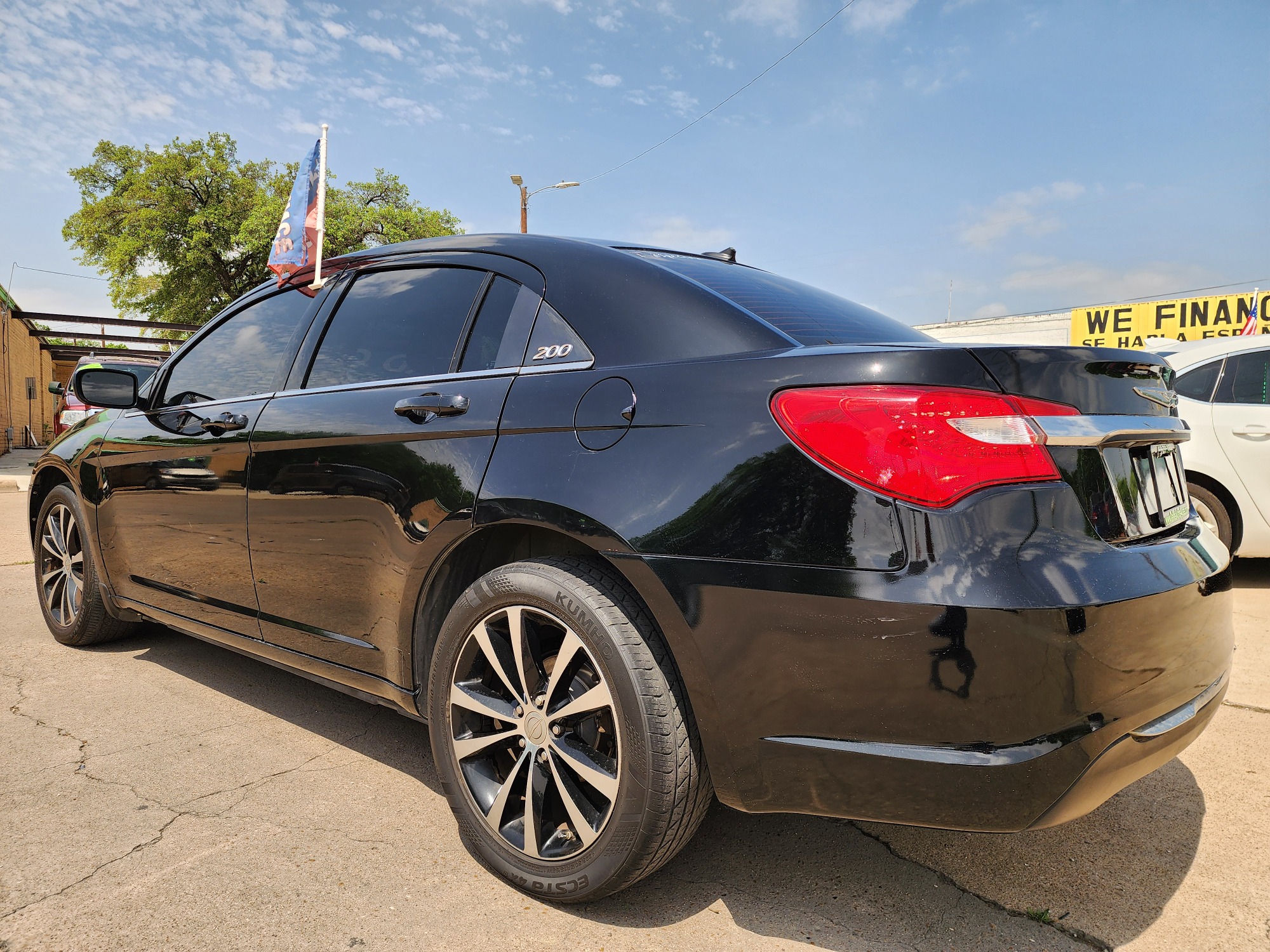 2013 BLACK Chrysler 200 Touring (1C3CCBBB2DN) with an 2.4L L4 DOHC 16V engine, 6-Speed Automatic transmission, located at 2660 S.Garland Avenue, Garland, TX, 75041, (469) 298-3118, 32.885551, -96.655602 - Welcome to DallasAutos4Less, one of the Premier BUY HERE PAY HERE Dealers in the North Dallas Area. We specialize in financing to people with NO CREDIT or BAD CREDIT. We need proof of income, proof of residence, and a ID. Come buy your new car from us today!! This is a very well cared for 2013 Ch - Photo #5